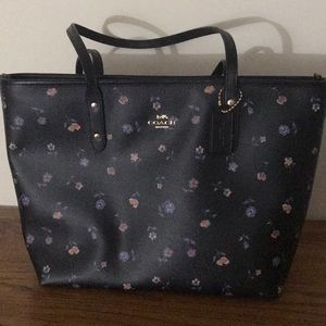Black flowered tote.  Only used one time!
